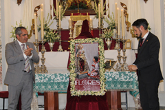 La Hermandad Virgen de Flores presenta el cartel de los Cultos Patronales